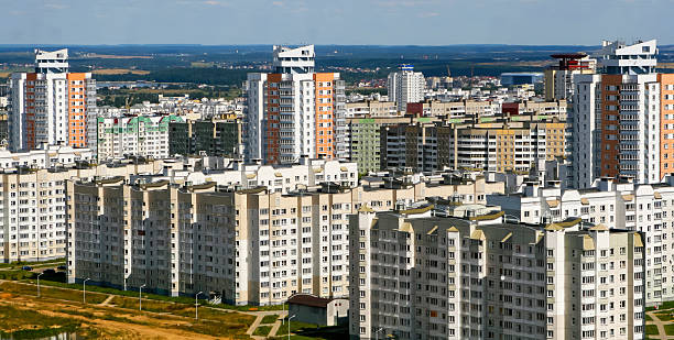 istock Modern cityscape featuring high-rise buildings and residential complexes with a clear sky background 2220765942