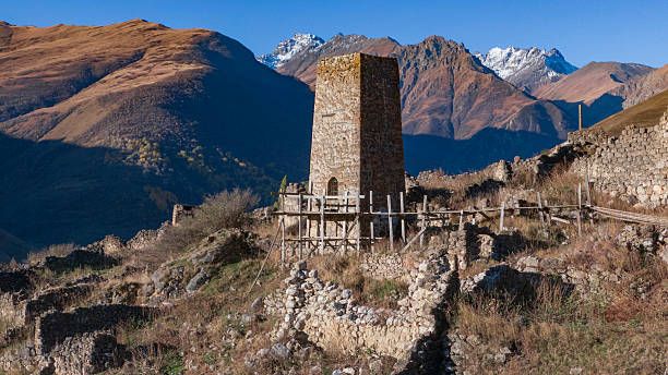 istock medieval tower in the Caucasus Mountains. medieval city 2220766694