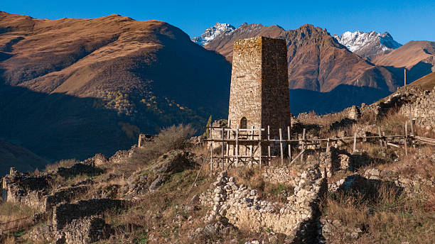 istock medieval tower in the Caucasus Mountains. medieval village 2220766701