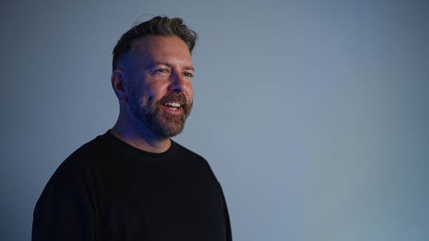 Studio video portrait of comedian talking to a crowd