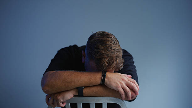 istock Studio video portrait of man feeling sad and stressed 2220768646
