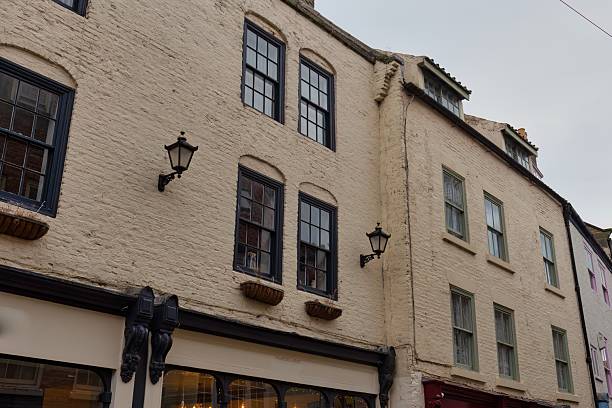 istock A three-story building with a light tan facade is captured 2220778605