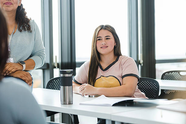 istock Confident Young Woman Sitting in Classroom, Casual 2220780937