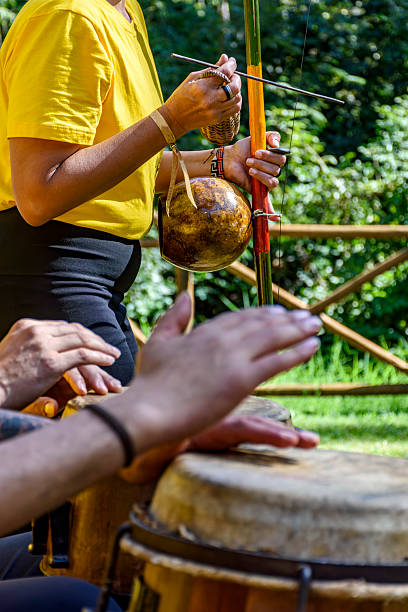 istock Group of people playing berimbau and atabaque 2220780976