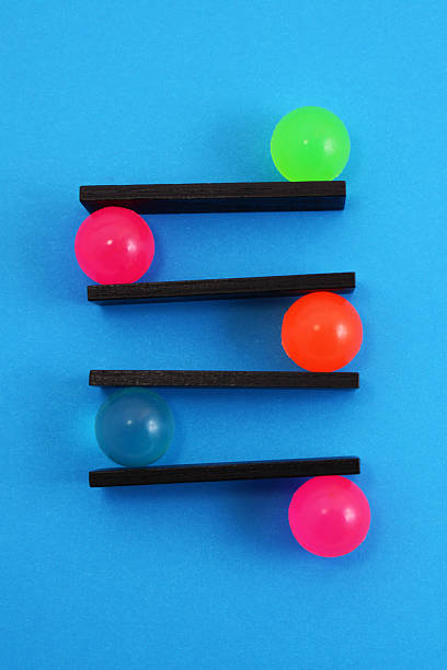 istock Spheres that balance the different levels 2220782616