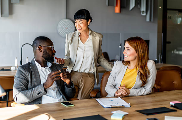 istock Business team discussing work in modern office 2220786388