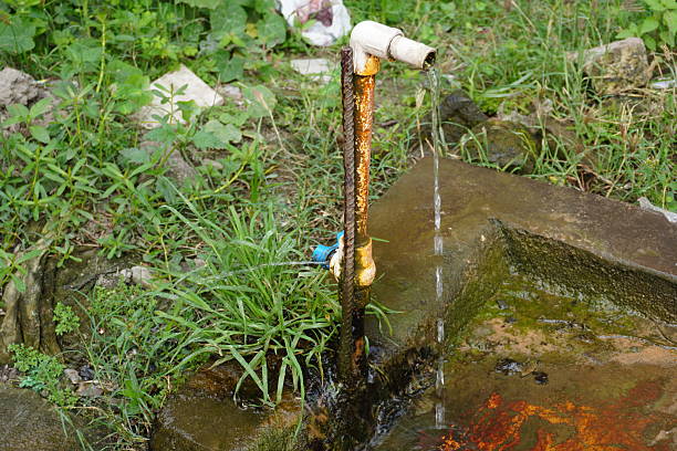 istock The water is falling from a tap, the tap got rusted 2220787897