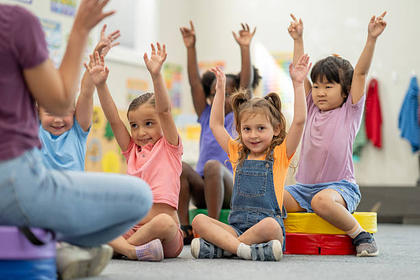 istock Children Enjoying an Interactive Lesson at a Colorful Preschool Classroom 2220789433