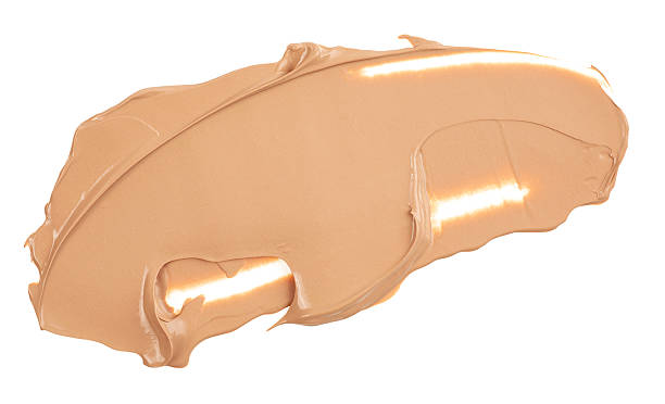 istock Beige stroke and texture of makeup foundation isolated on a white background. Concealer. Makeup foundation creamy texture. 2220792421