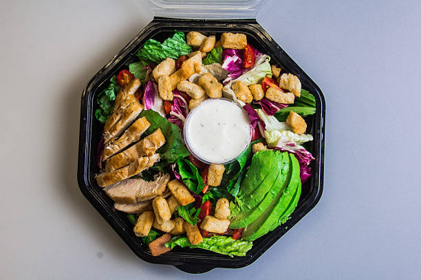 istock A vibrant salad featuring sliced chicken, fresh vegetables, and creamy dressing, representing a harmonious blend of health and flavor in a delightful meal option. 2220792714