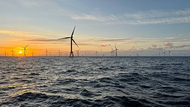istock Sunset - Wind Farm - North Sea 2220796260