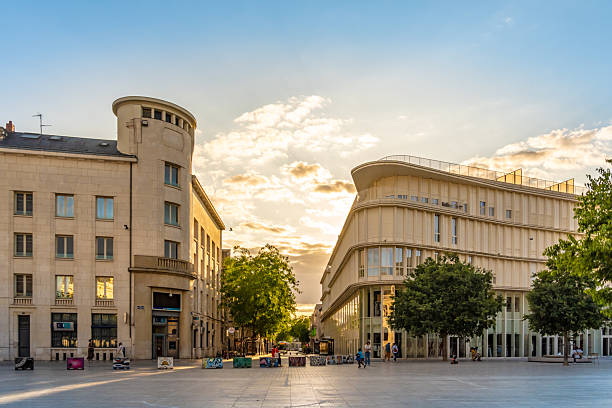 Poitiers, France. 15 June 2025. Sunset over shops in Poitiers town centre