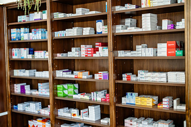 istock Shelves stocked with various pharmaceutical packages in an organized arrangement 2220801936