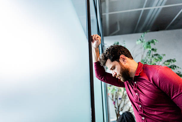 istock Worried businessman in the office 2220803210