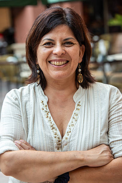 istock Smiling mature woman posing looking at the camera 2220804294