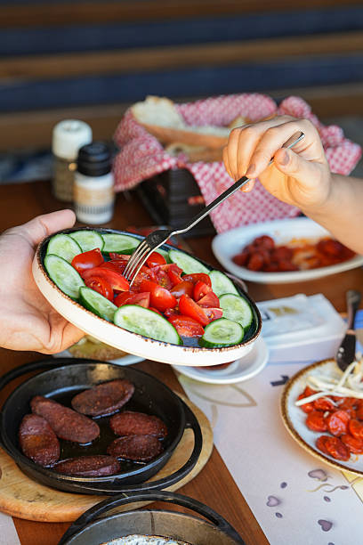 istock Sharing a Plate of Fresh Salad During Breakfast 2220809264