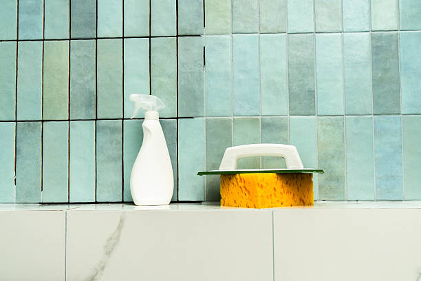 istock Efficient repair process using epoxy grout and adhesive in a tiled bathroom area 2220812219