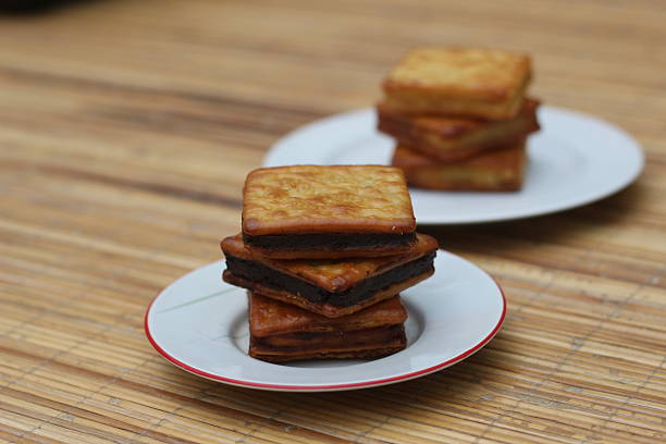 istock Delicious Chocolate Sandwich Crackers on a Wooden Table 2220826205