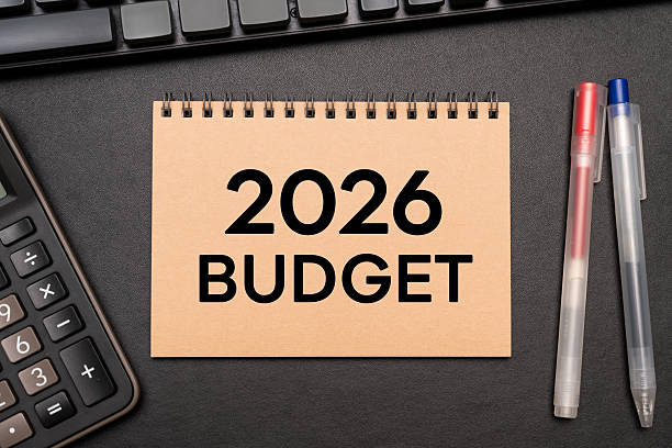 istock 2026 BUDGET with calculator and office supplies. 2220827125