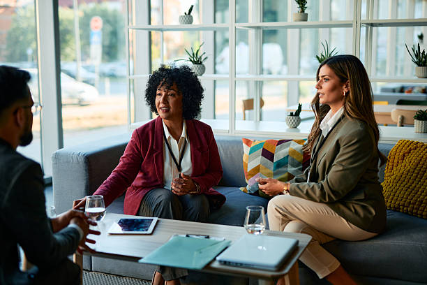 istock Businesspeople discussing during a meeting in a modern office 2220840286