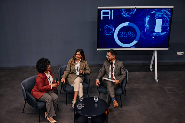 istock Speakers discussing artificial intelligence during a business convention 2220840567