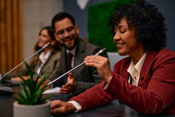 istock Politician speaking at a press conference, answering questions from journalists 2220841163