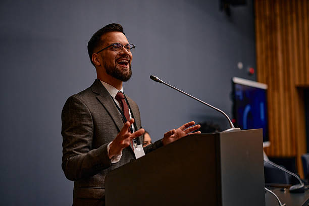 istock Motivational speaker laughing during a conference 2220841195