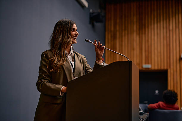 istock Young businesswoman delivering a speech at a conference 2220841205