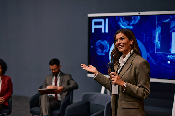 istock Businesswoman presenting artificial intelligence during a convention 2220841280