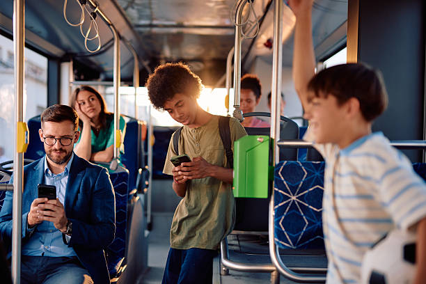 istock Passengers using smartphones on a modern bus during their daily commute 2220843143