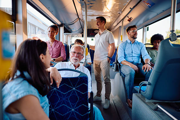 istock Diverse group of people traveling on a modern bus 2220843522