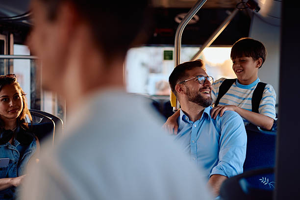 istock Father and son enjoying a bus ride together 2220843659