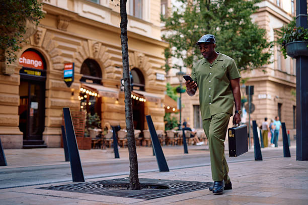 Businessman walking in the city going to the office.