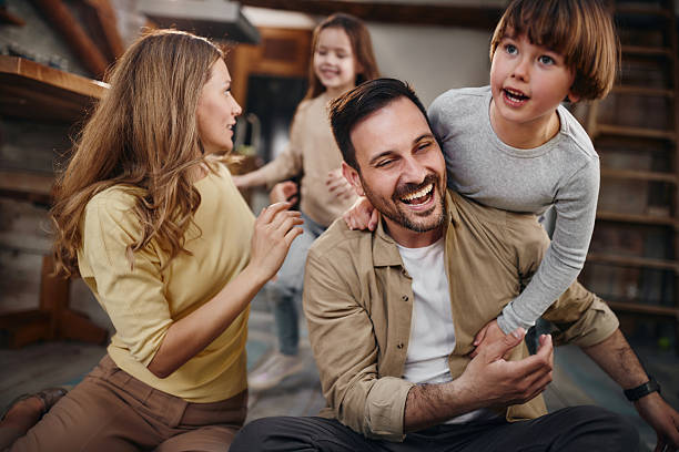 istock Cheerful family having fun at home. 2220846811