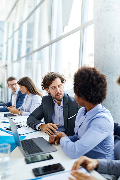 istock Business colleagues talking during a meeting in the office. 2220848026