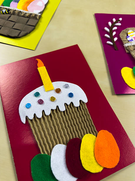 istock Whimsical handmade Easter card features decorated cake with candle 2220851958