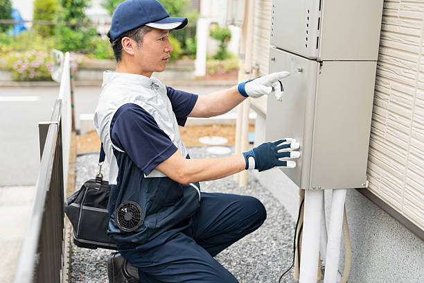 istock A male worker inspecting a water heater 2220860752