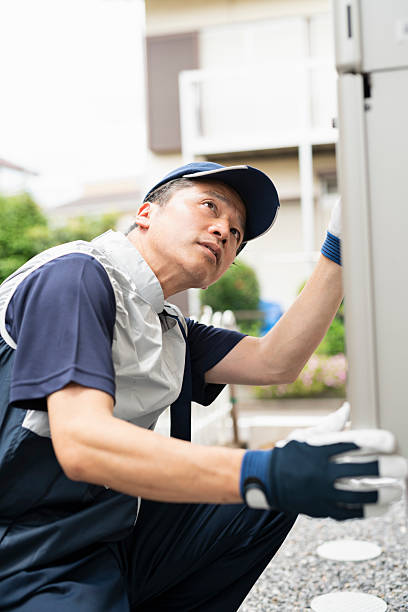 istock A male worker inspecting a water heater 2220863290