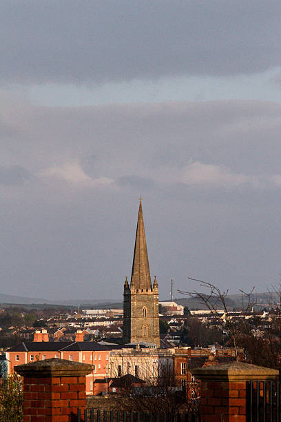 istock Cathedral Spire Beyond Brick Wall, Derry, Northern Ireland 2220863465