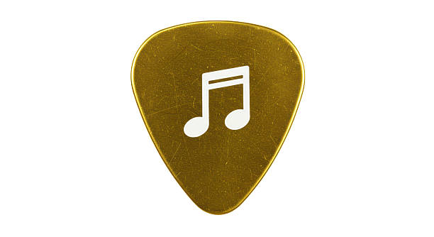 Isolated Golden Guitar Pick with Musical Note Symbol
