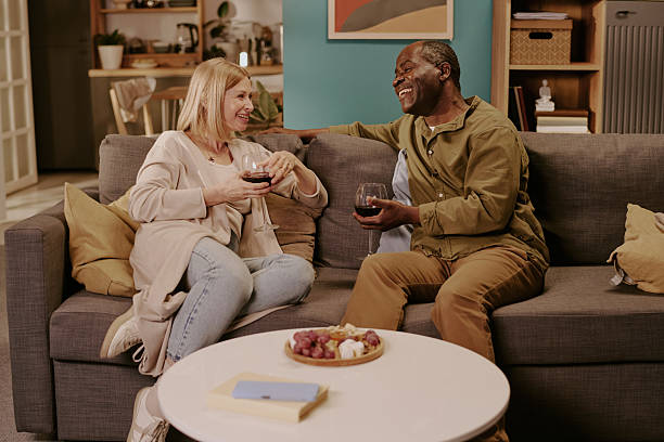 istock Diverse Senior Couple Enjoying Romantic Conversation Indoors 2220870201