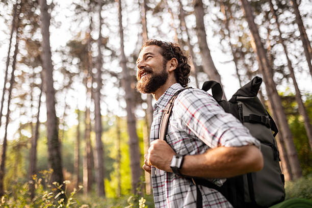 istock Nature Lover with Backpack on a Journey Through the Wild 2220870773