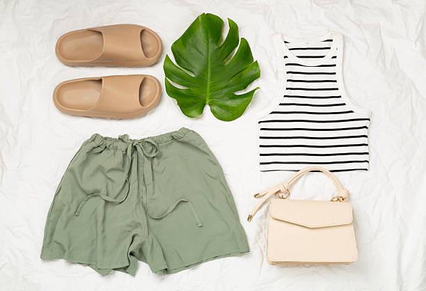 istock Flat lay with casual summer outfit on color background, top view 2220872049