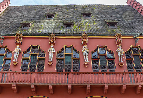 The Historisches Kaufhaus (Historical Department Store) is one of the most striking and important buildings in Freiburg im Breisgau. It is located on the south side of Münsterplatz, directly opposite Freiburg Minster, and its striking red façade dominates the cityscape.