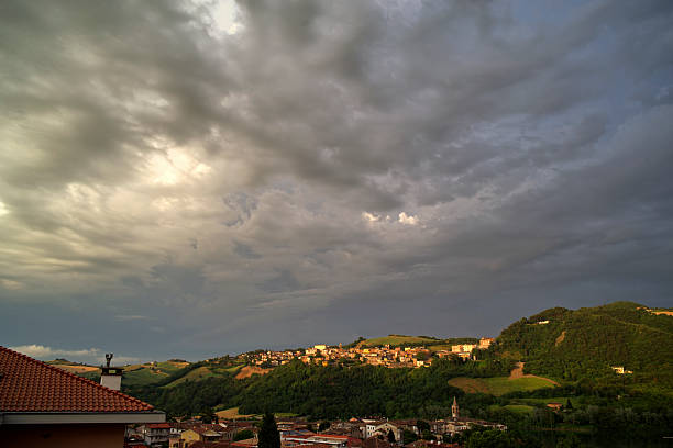 istock hilly landscape against a stormy sky 2220874079
