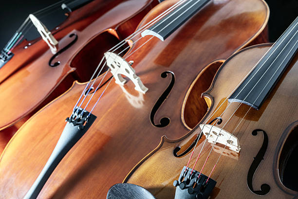 Violin and cello classical music orchestra background or string quartet music school tuition and education