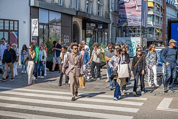 Pedestrian Zone, Copenhagen, Zealand, Denmark - June13th 2025: The pedestrian areas in the center of Copenhagen are popular with both native Danes and tourists, all enjoying the vibrant city life.