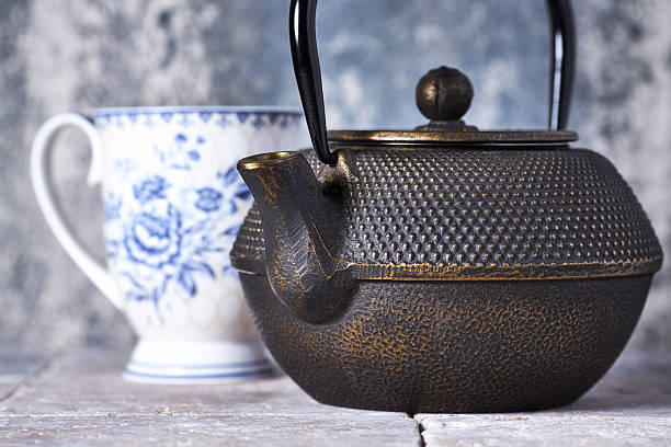 istock Japanese Cast Iron Teapot on bright background. 2220884027