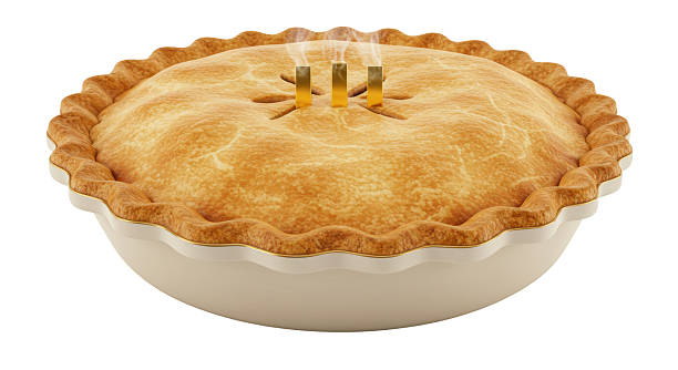 A slice of apple pie with vanilla ice cream on a rustic table top.