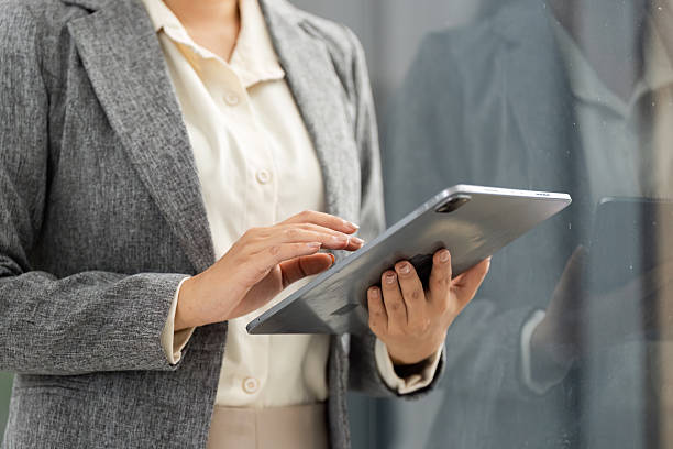 istock Digital Transformation. Businesswoman using tablet for work in modern office. 2220888033